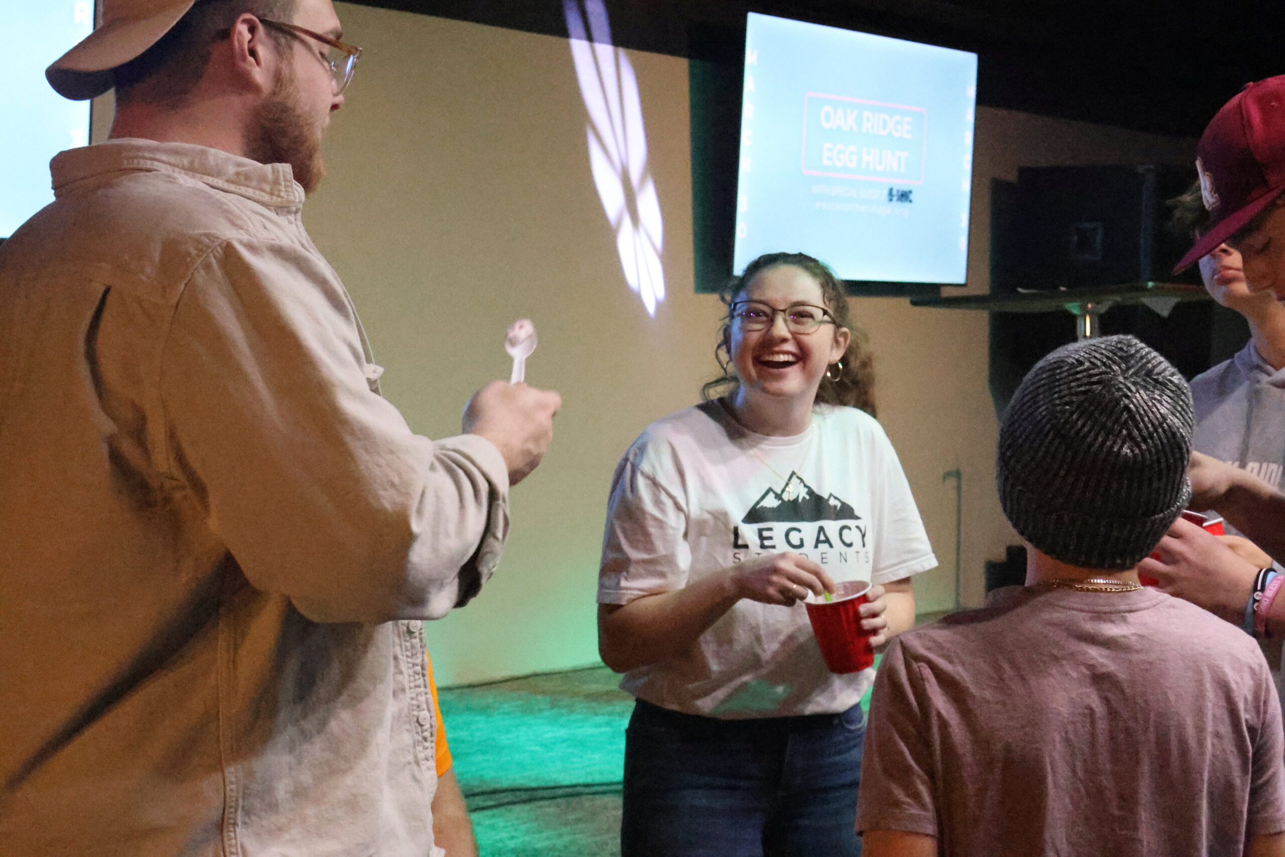 A children's ministry team leading worship